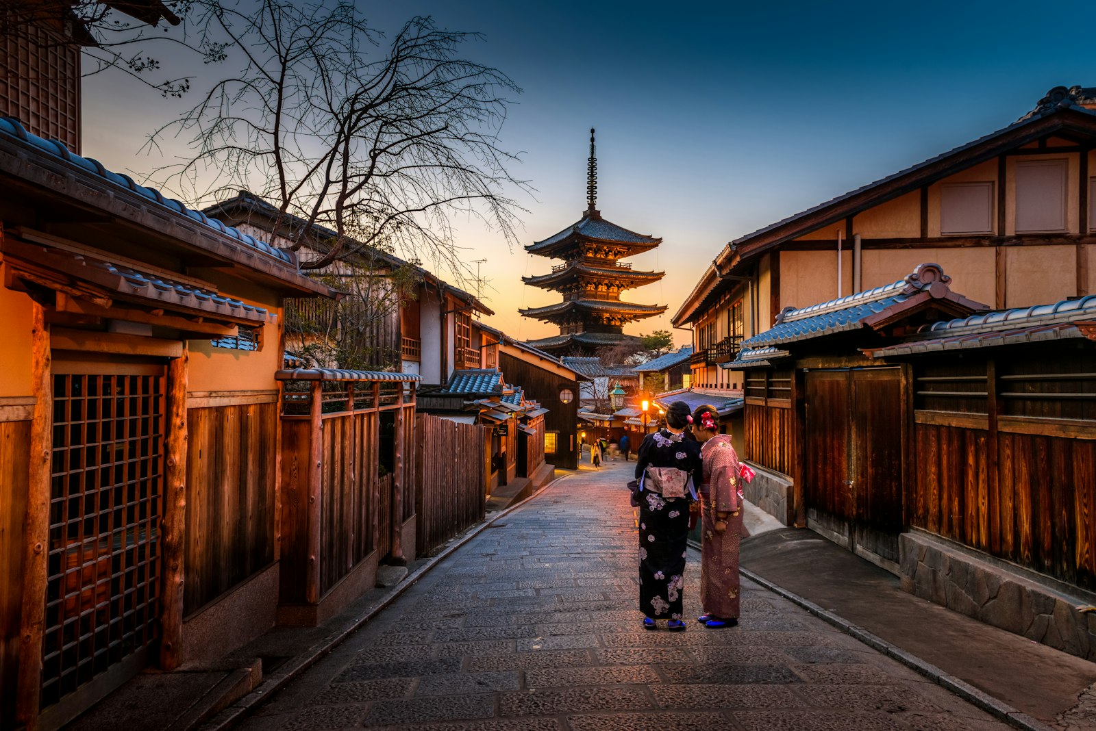Mt Fuji with a red pagoda and cherry blossoms in spring